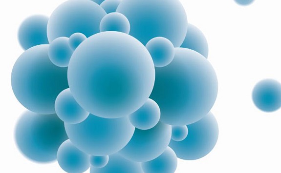 Cluster of differently sized blue spheres floating on a white background
